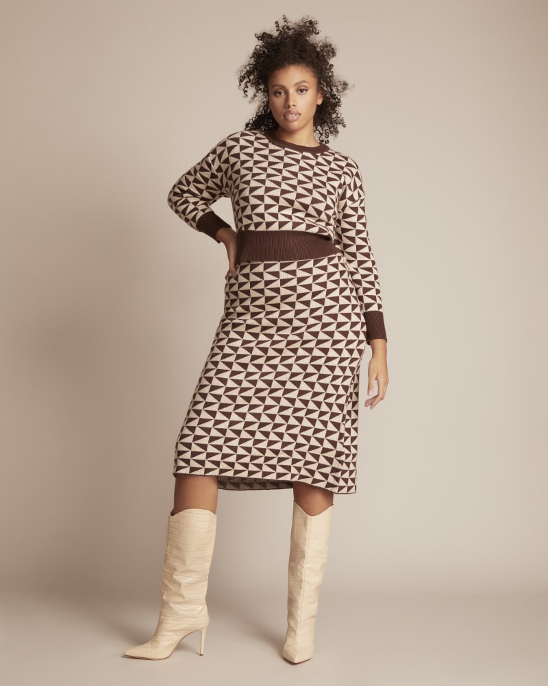Side of a model wearing a size 1 Alexis Sweater in Brown by 11 Honoré Collection. | dia_product_style_image_id:314794
